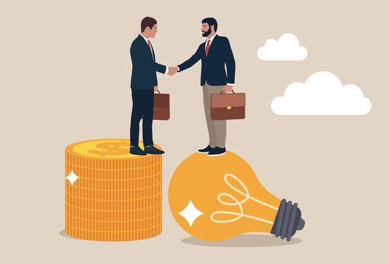 Two businessmen are shaking hands on top of a light bulb.