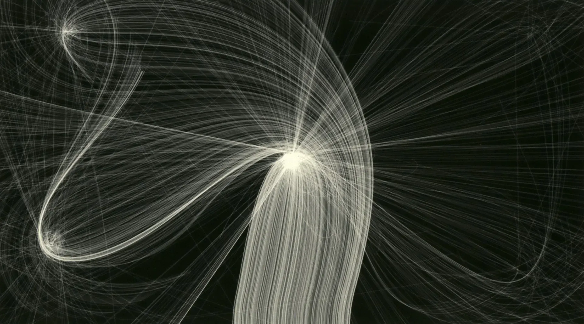 White, swirling lines against a dark background, creating a complex, abstract pattern that resembles light trails.